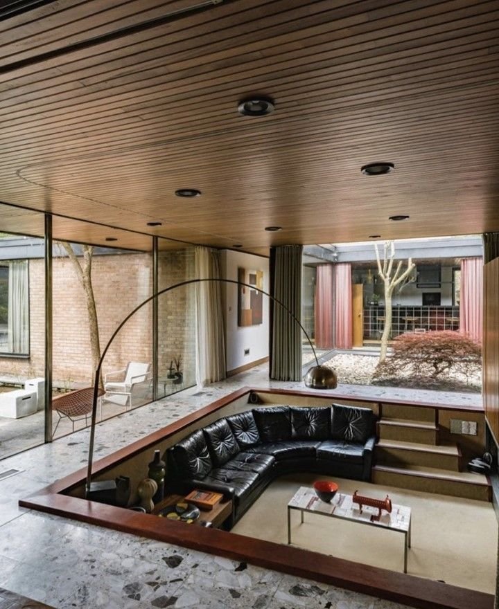 10 Stunning Sunken Living Room Ideas That'll Make Your Friends Jealous! - 3. Retro Circular Paradise